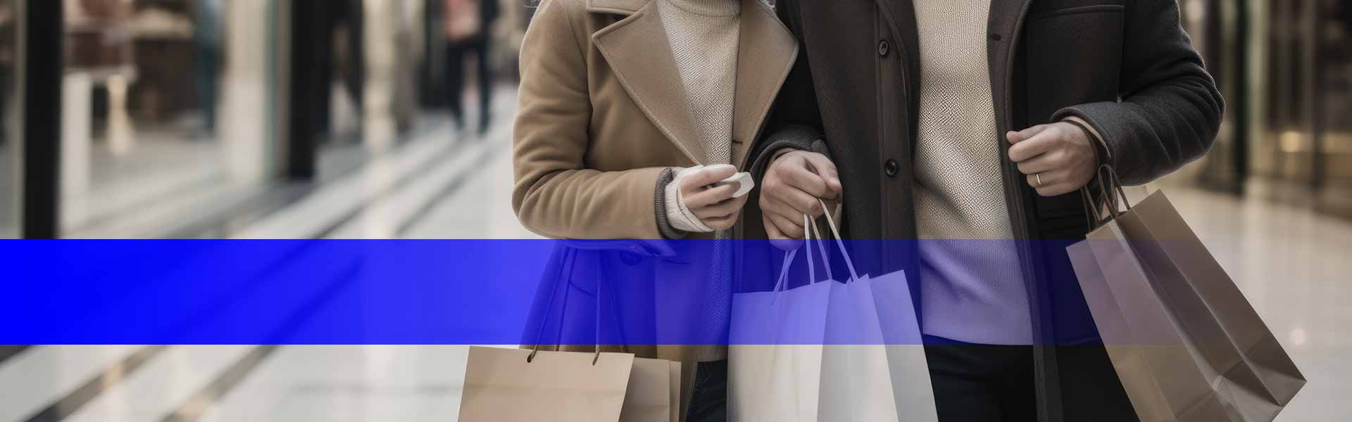 Kategorie Events Shopping - Ein Paar mit mehreren Einkaufstaschen